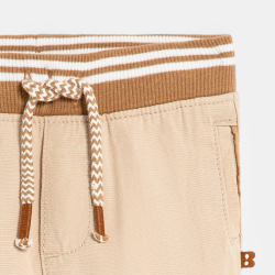 Pantalon modulable beige...