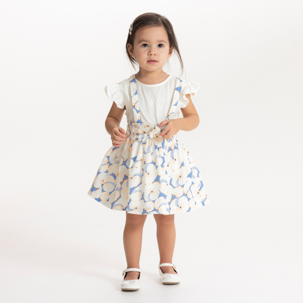 Ensemble jupe fleurie à bretelles et t-shirt blanc bébé fille
