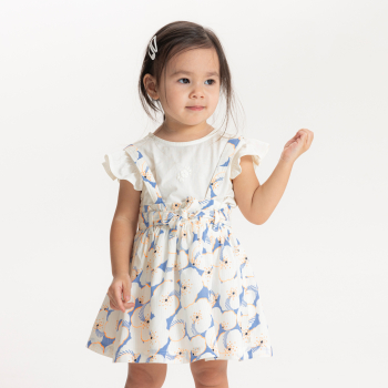 Ensemble jupe fleurie à bretelles et t-shirt blanc bébé fille