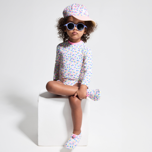 Combi de bain fleurie rose bébé fille